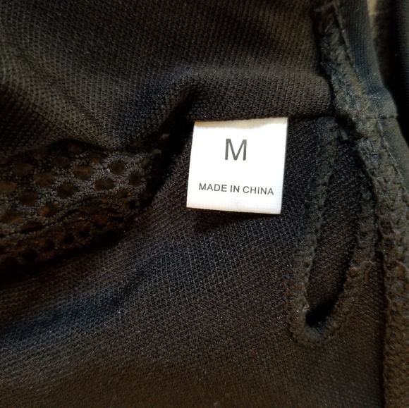 Black one piece suit - Picture 4 of 6